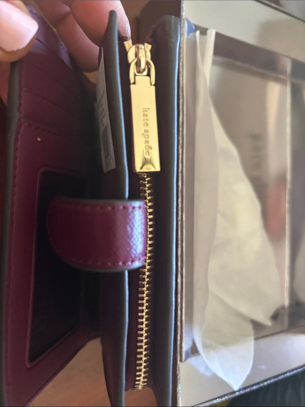 kate spade burgundy and gold zip-around wallet